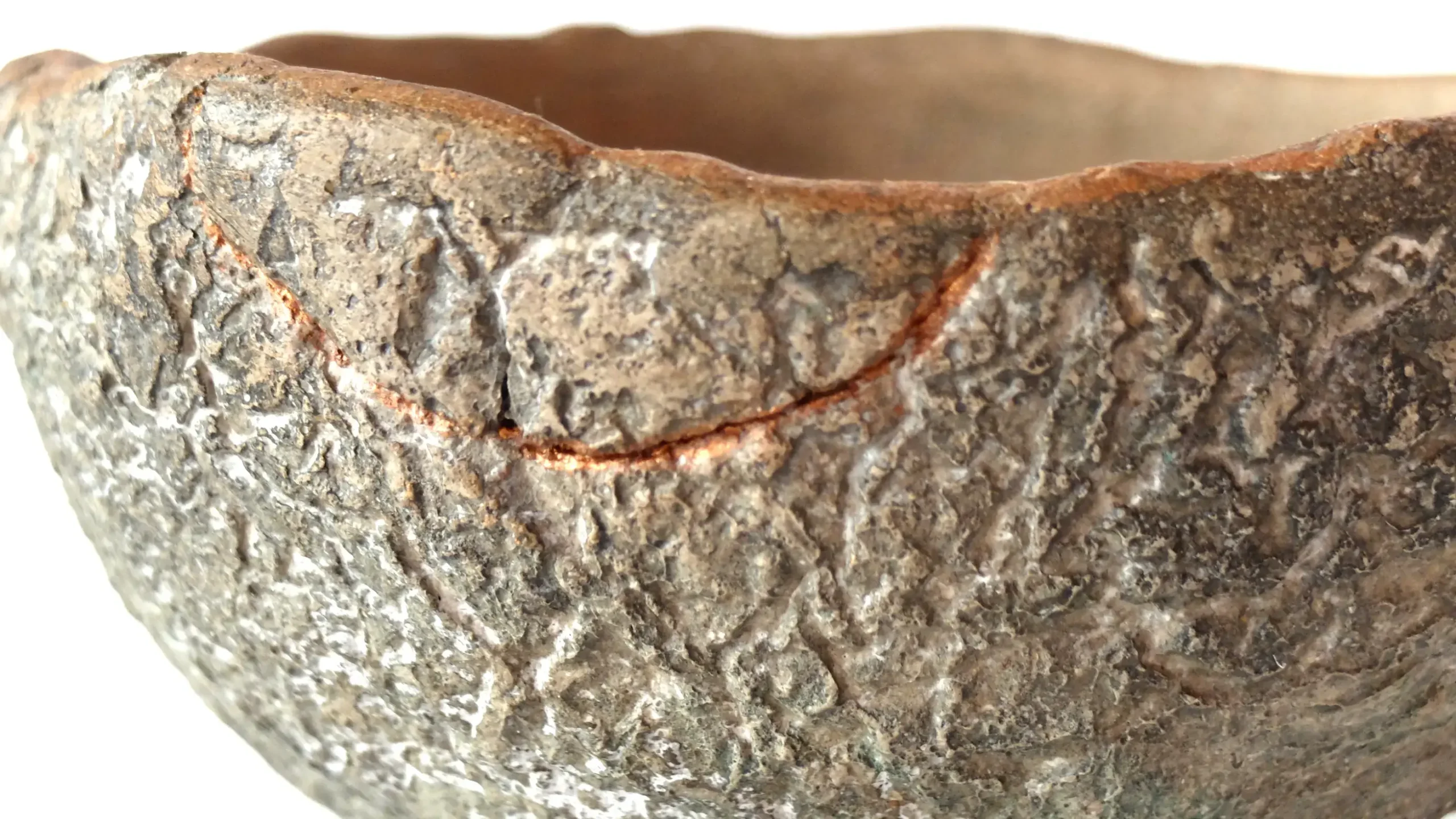 Detail of a 53 Design Lab concrete piece with a copper-inhabited crack