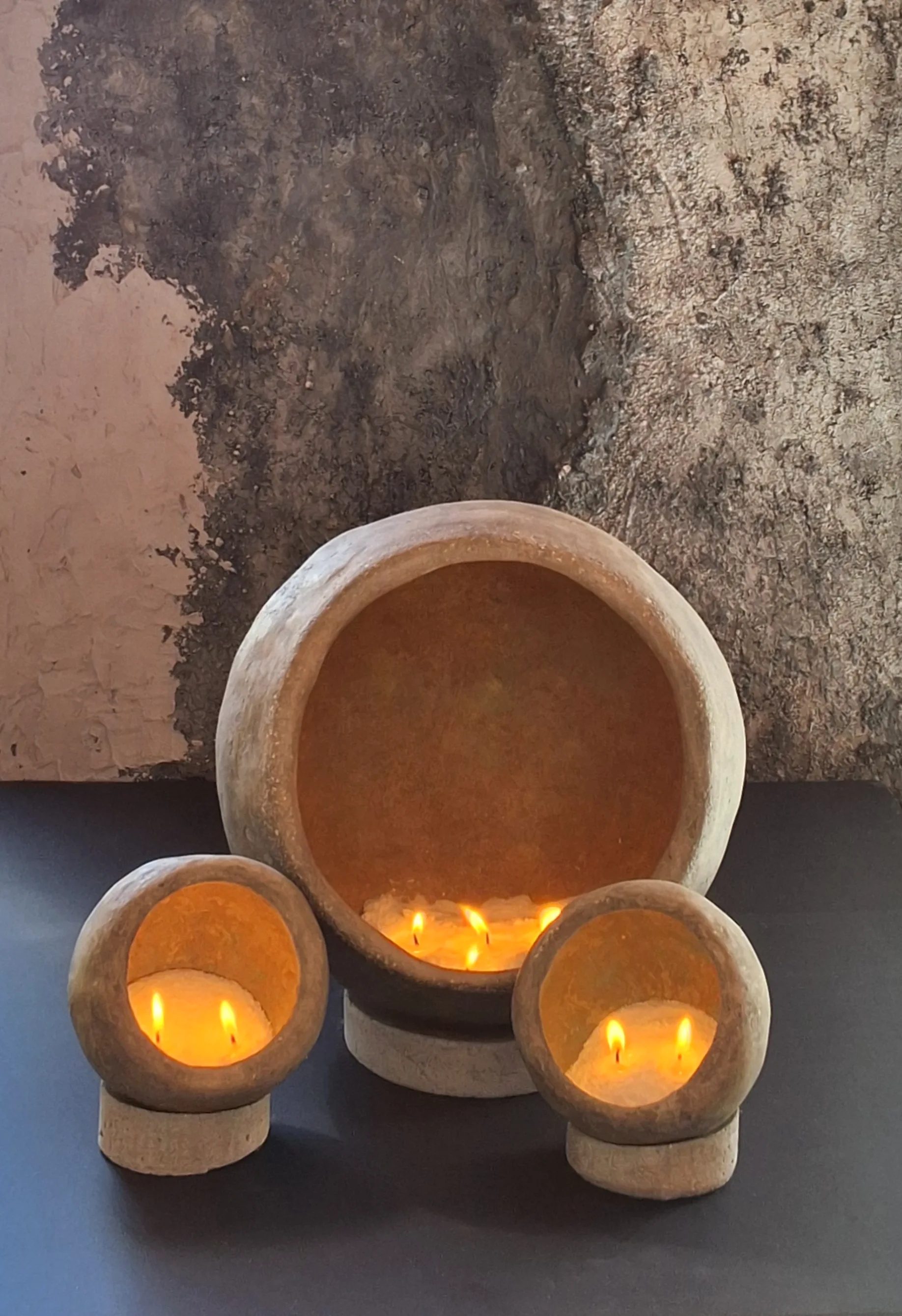Family of concrete bowls activated with fire